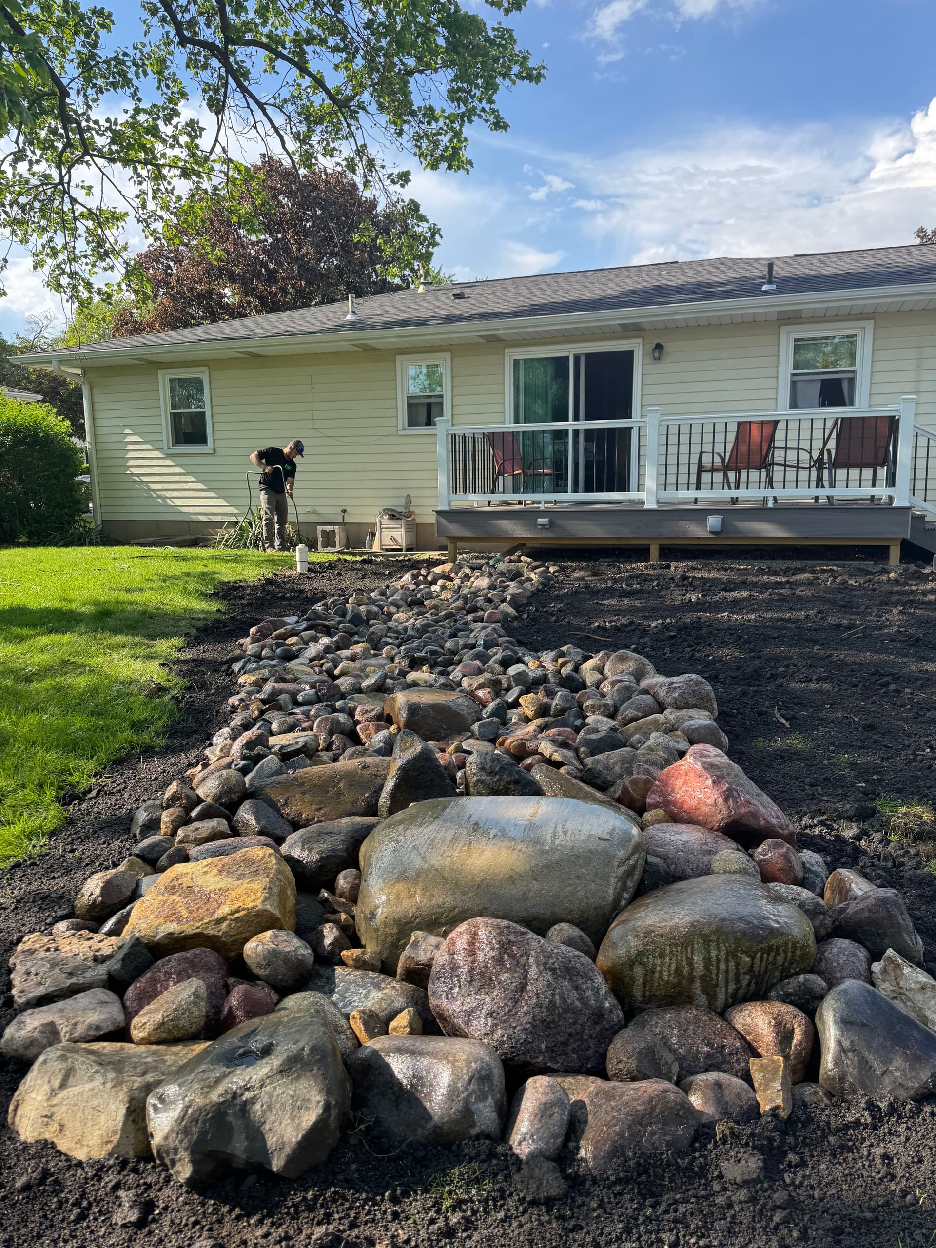 Gallery photos for Dry Creek Bed Fixes Backyard Drainage Without Killing the Curb Appeal: Image #3