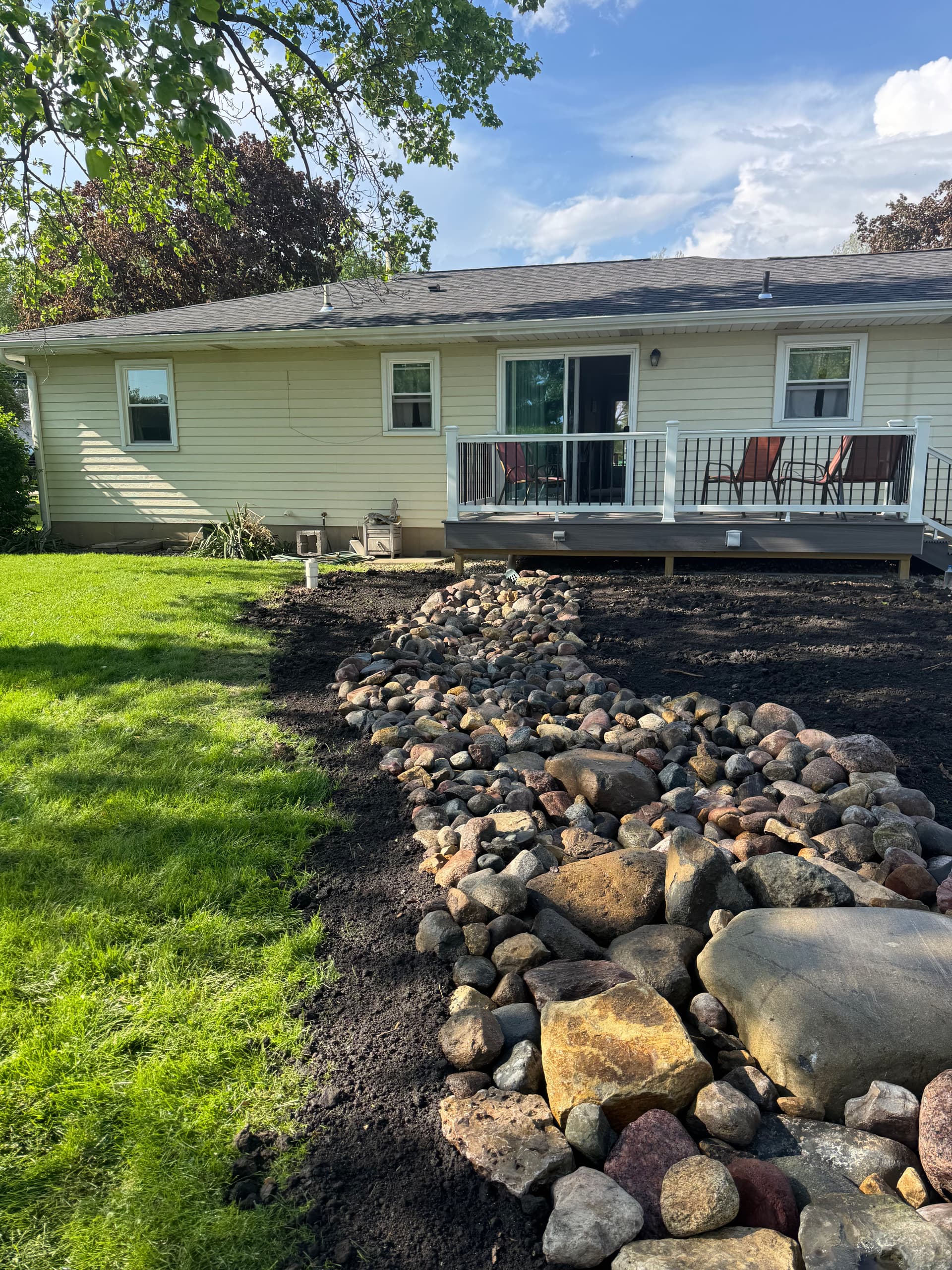 Gallery photos for Dry Creek Bed Fixes Backyard Drainage Without Killing the Curb Appeal: Image #5