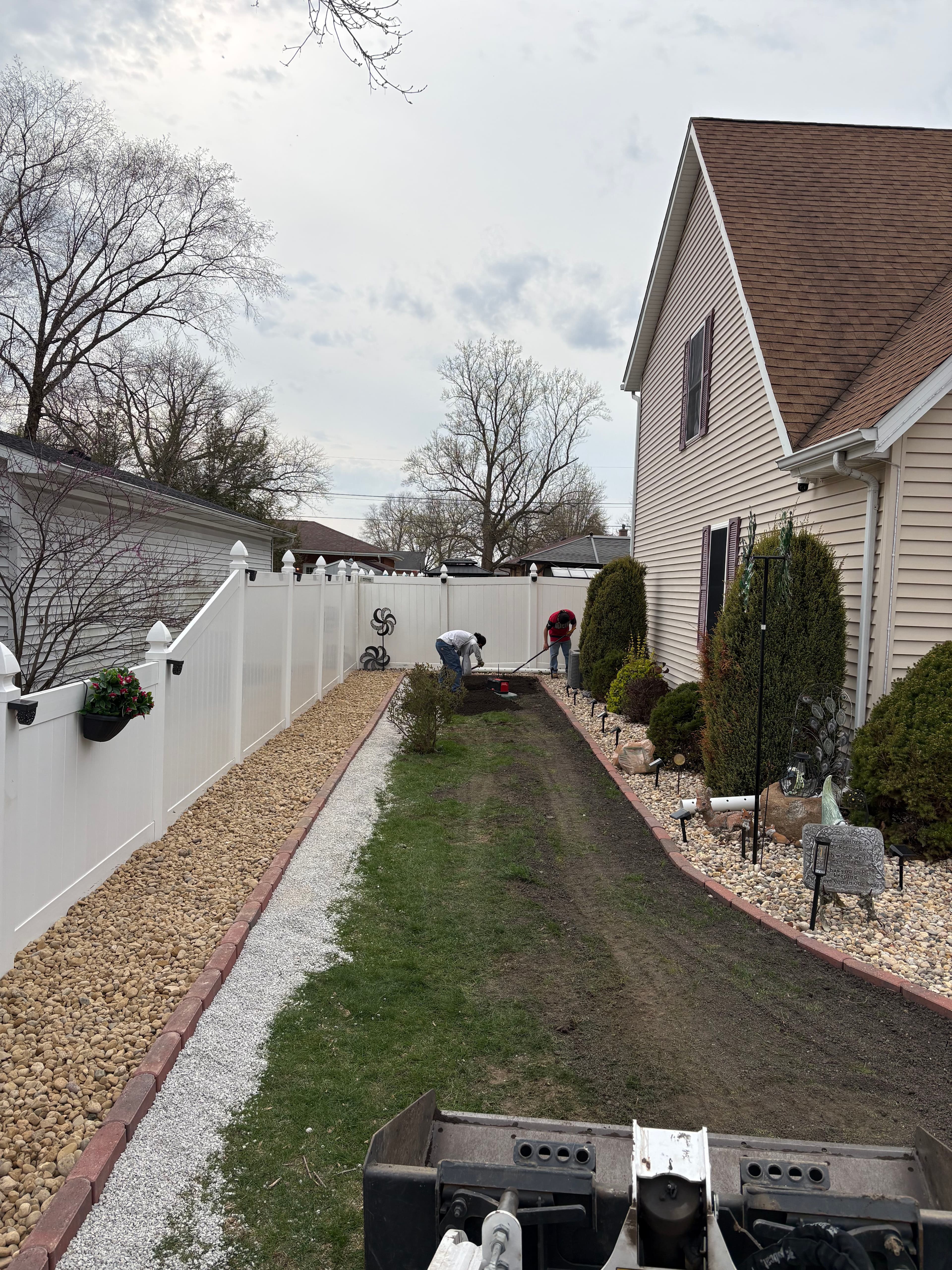 Project Side Yard Grading and Stone Path Install for a Returning Client image