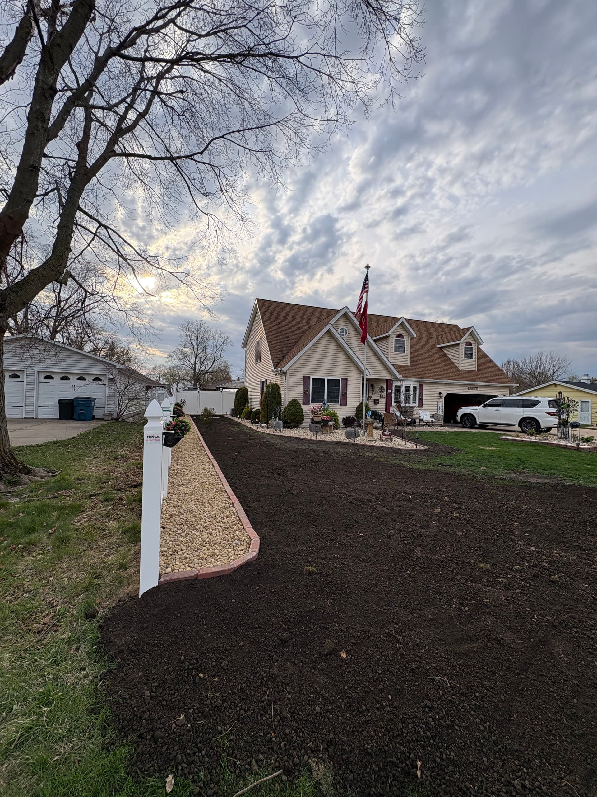 Side Yard Grading and Stone Path Install for a Returning Client