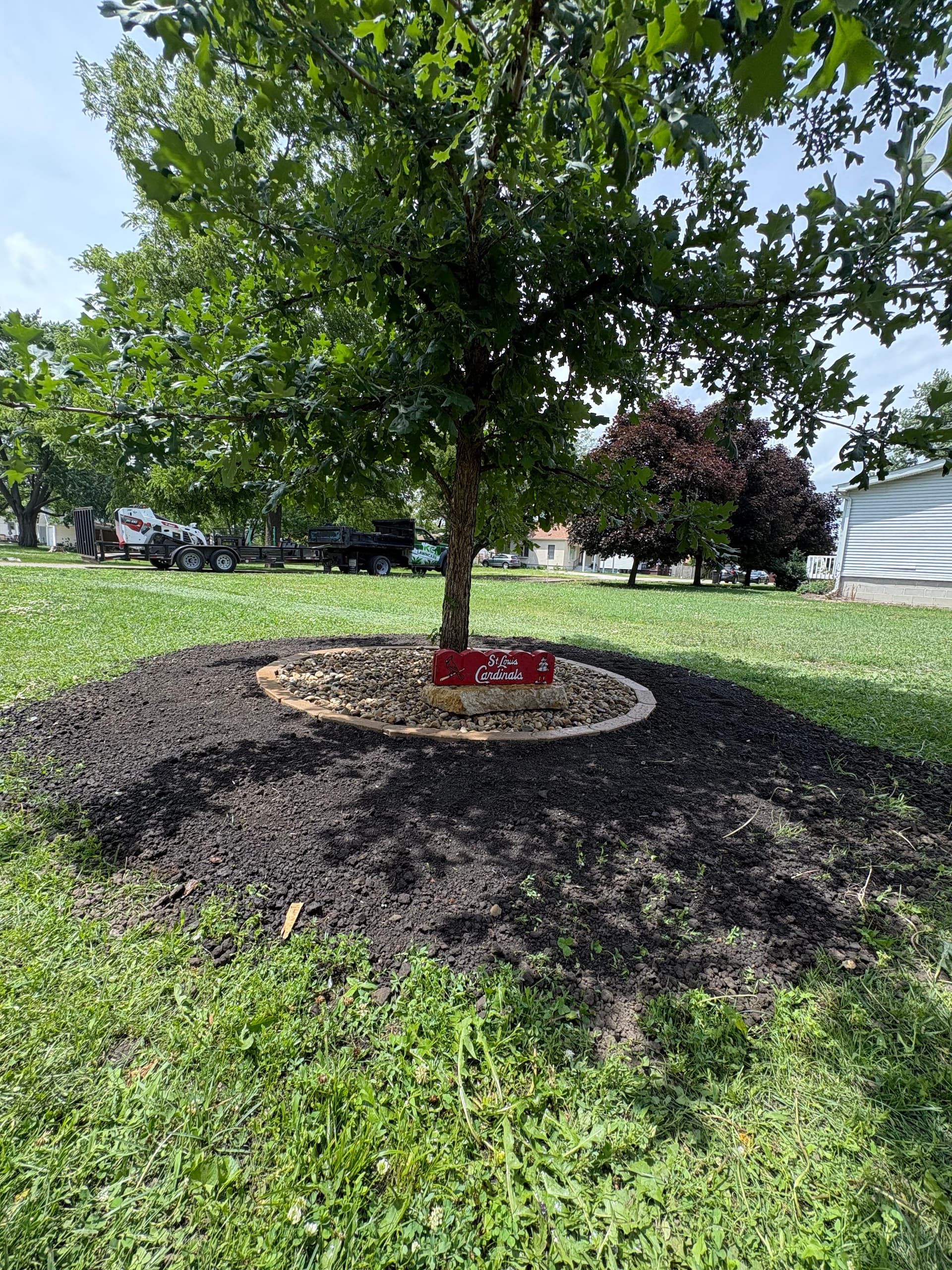 Gallery photos for Flower Bed Extension with River Rock and Fresh Mulch: Image #4