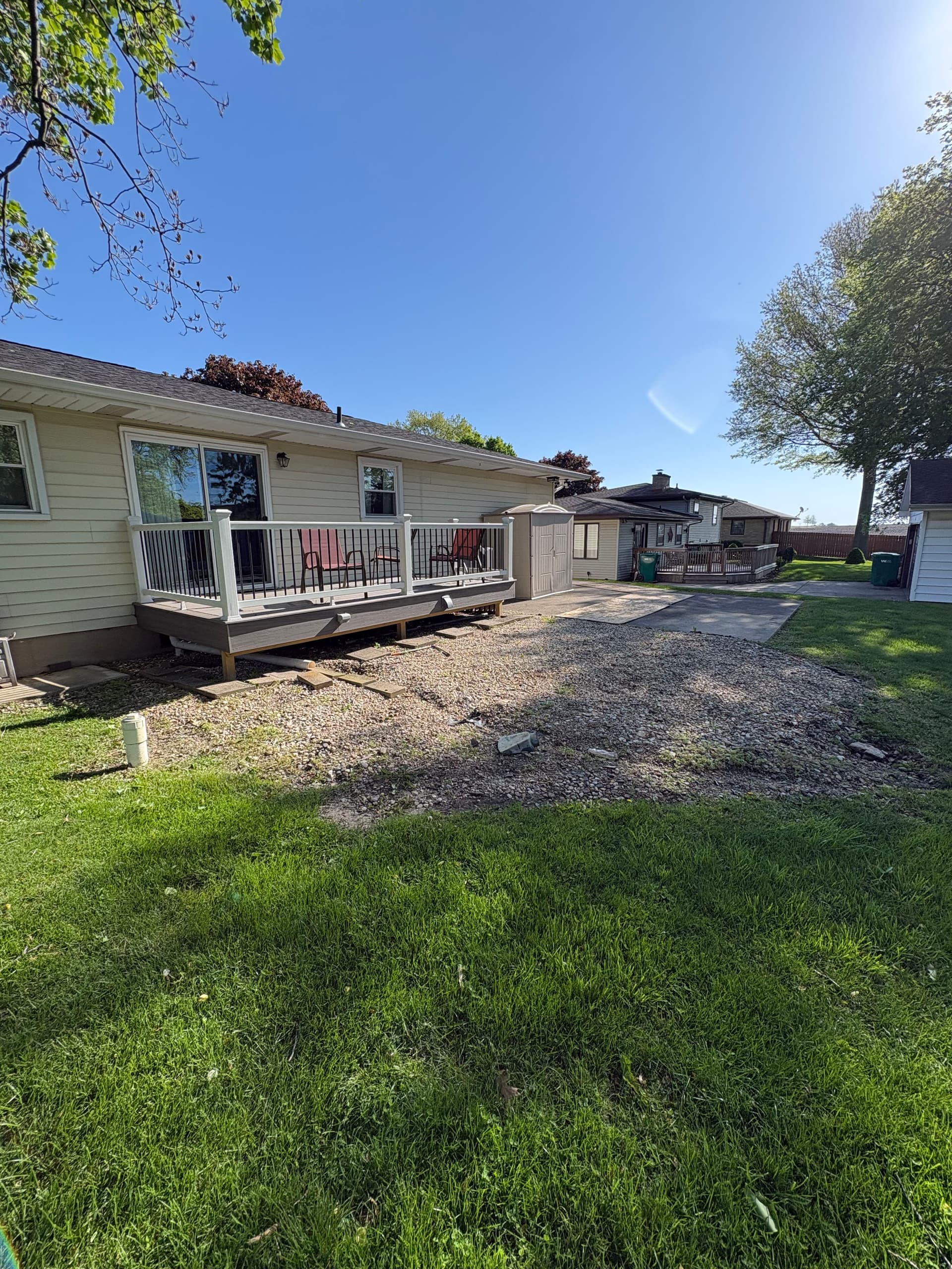 Gallery photos for Dry Creek Bed Fixes Backyard Drainage Without Killing the Curb Appeal: Image #1