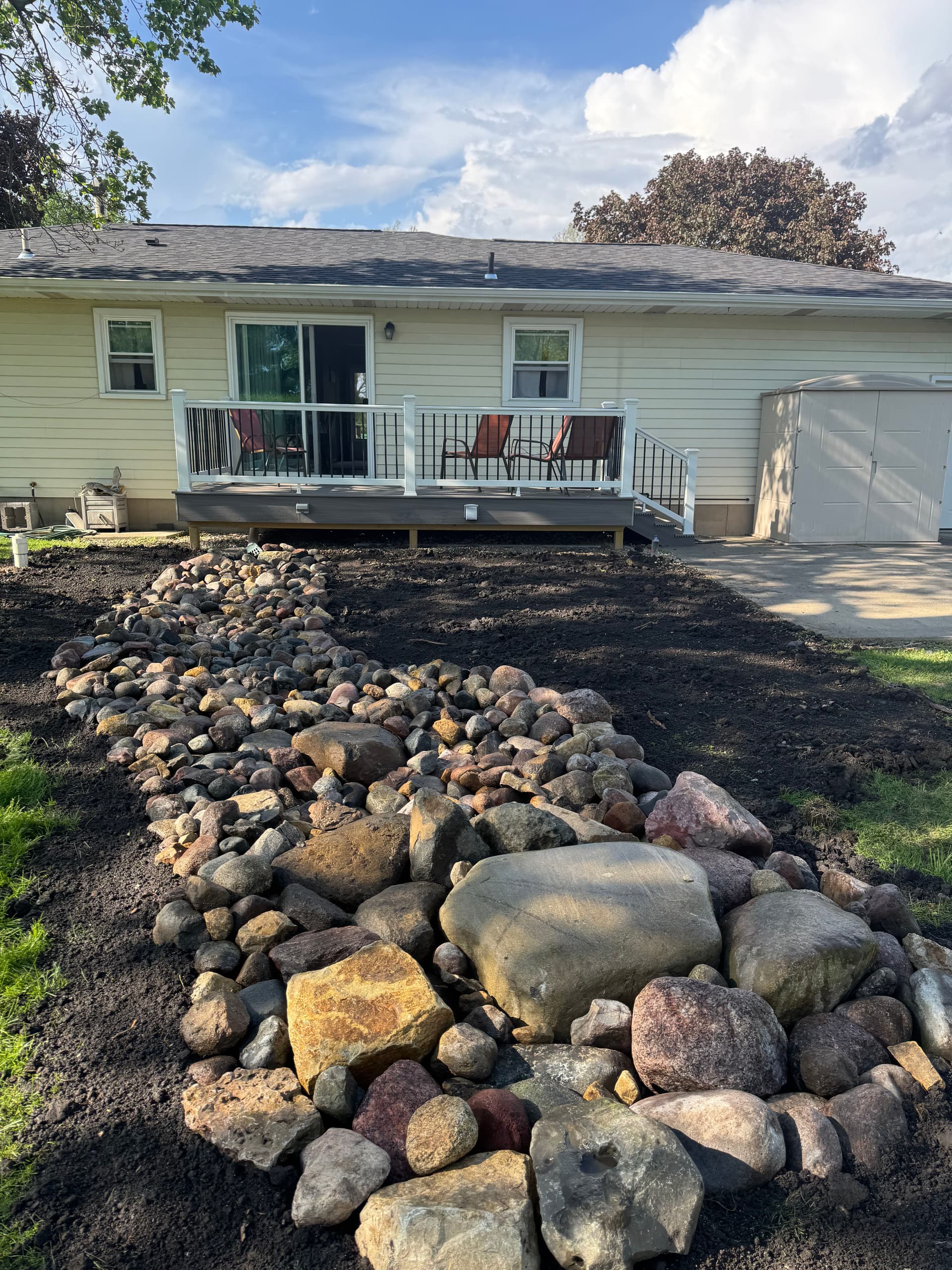 Gallery photos for Dry Creek Bed Fixes Backyard Drainage Without Killing the Curb Appeal: Image #4