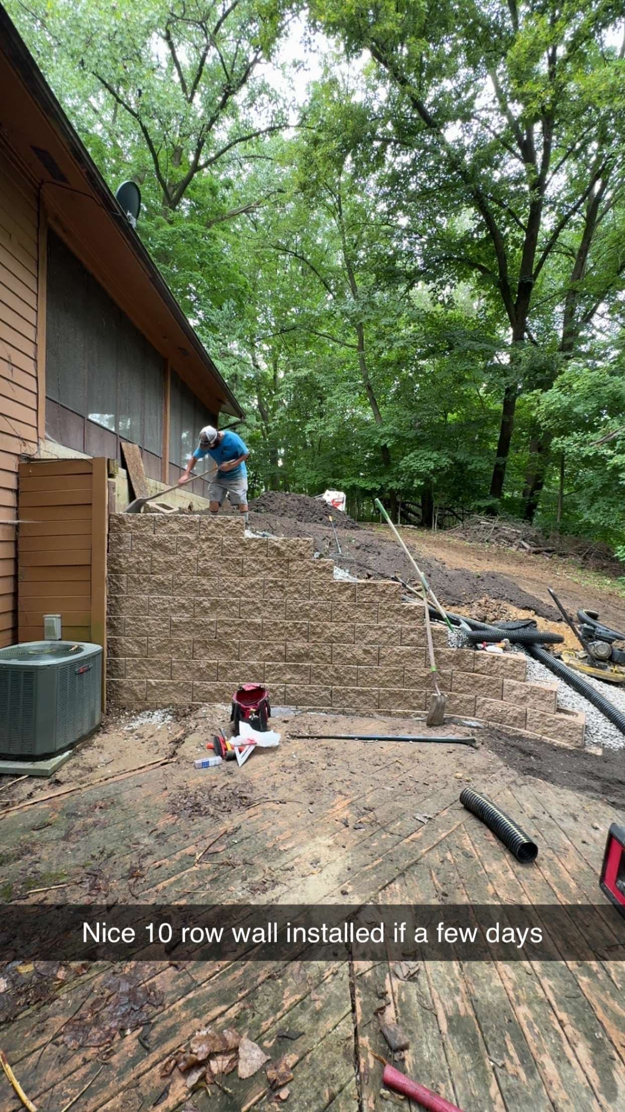 Gallery photos for Retaining Wall and Drainage Fix Along a Sloped House Foundation: Image #1