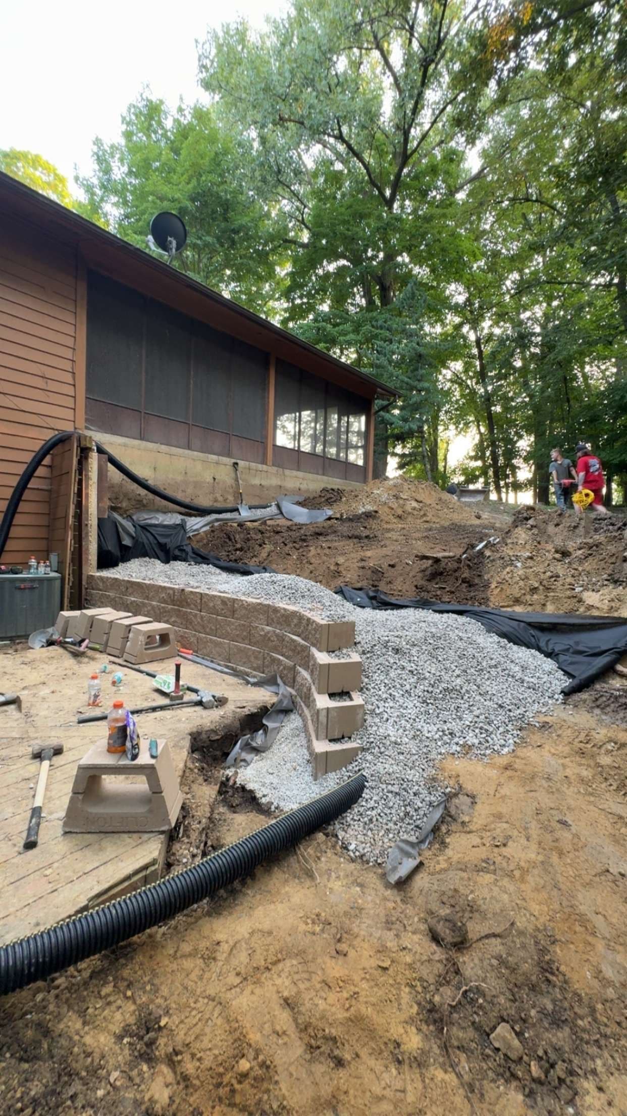 Gallery photos for Retaining Wall and Drainage Fix Along a Sloped House Foundation: Image #5