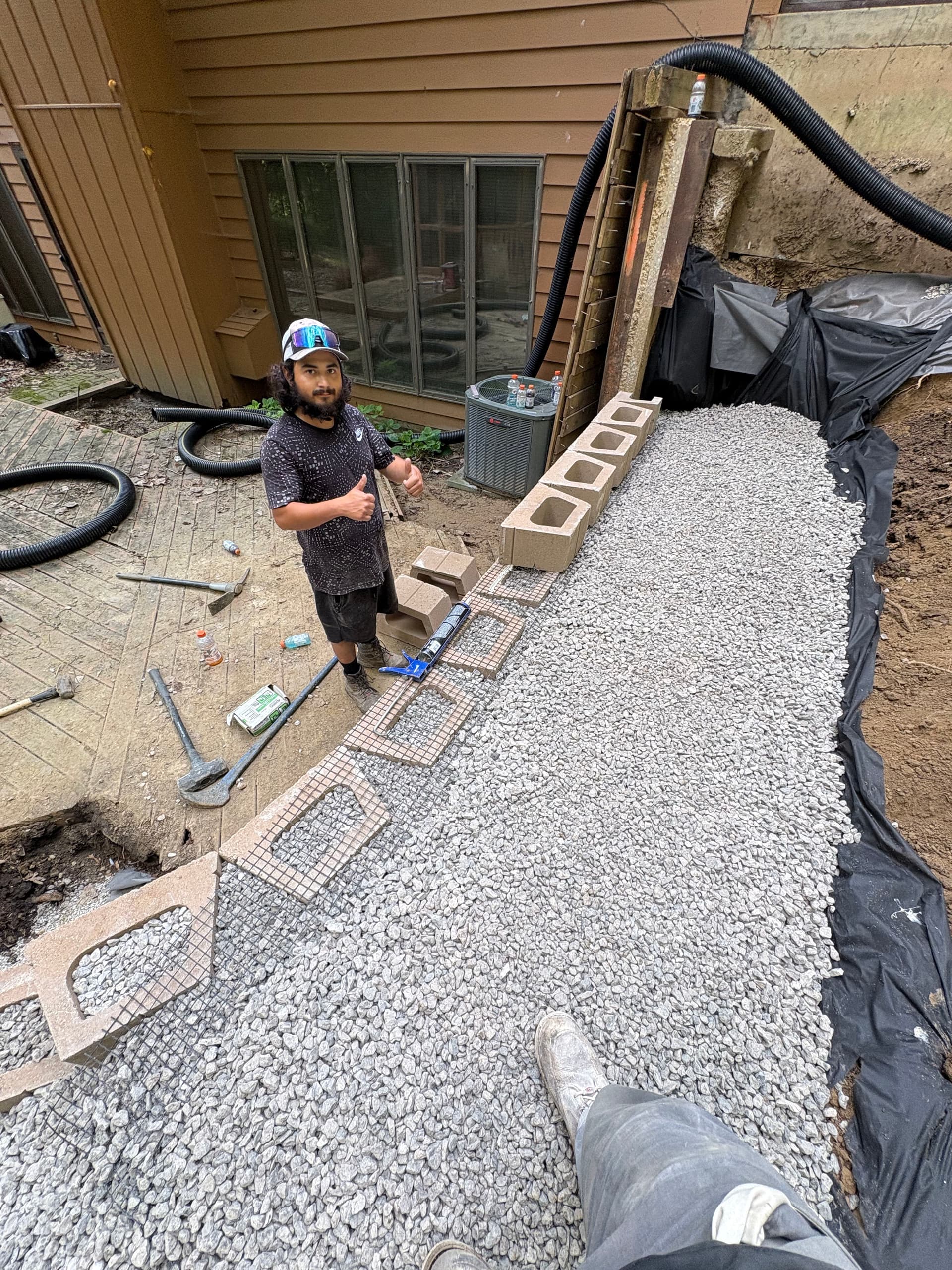 Gallery photos for Retaining Wall and Drainage Fix Along a Sloped House Foundation: Image #4